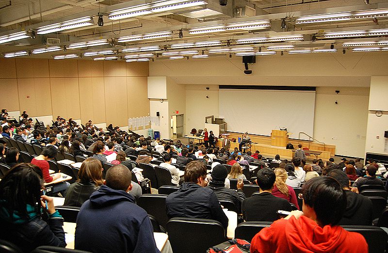 Students in a large lecture hall